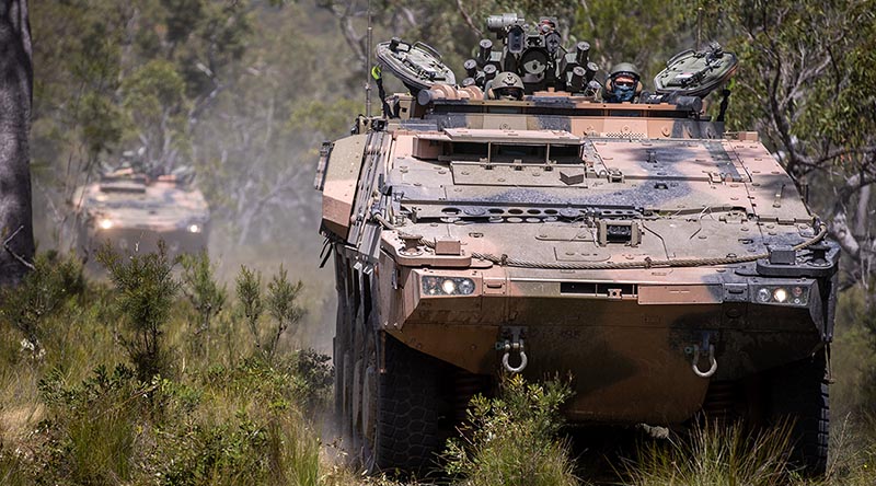 Soldiers from the 2nd/14th Light Horse Regiment (Queensland Mounted Infantry) conduct cross-country training in the new Boxer CRV at Wide Bay Training Area, Queensland. Photo by Trooper Jonathan Goedhart.