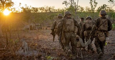 US Marines and sailors with Ground Combat Element, MRF-D, engage in casualty evacuation drills during Exercise Koolendong in Northern Territory, Australia. US Marine Corps photo by Corporal Sarah Marshall.