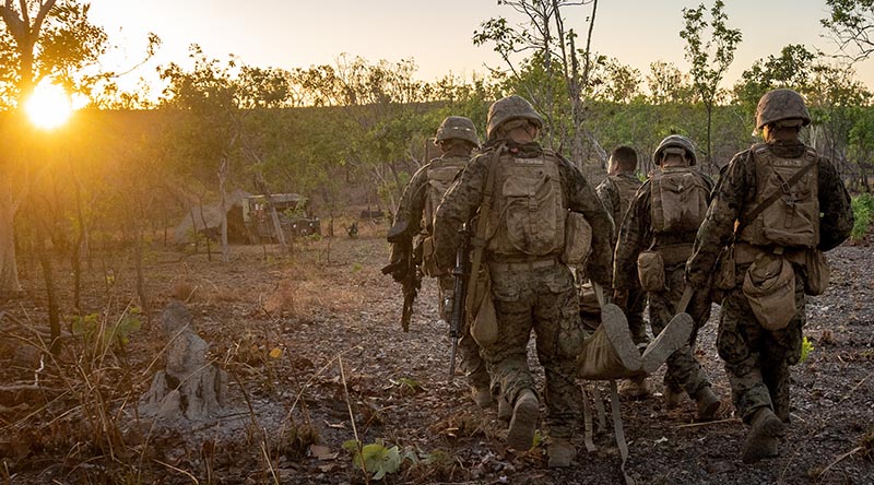 US Marines and sailors with Ground Combat Element, MRF-D, engage in casualty evacuation drills during Exercise Koolendong in Northern Territory, Australia. US Marine Corps photo by Corporal Sarah Marshall.