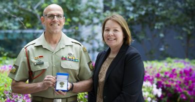 Warrant Officer Class 1 Rod Rootham with his wife Warrant Officer Class 2 Jo Rootham after receiving a Vice Chief of the Defence Force Gold Commendation in Canberra. Photo by Kym Smith.