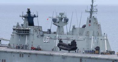 Republic of Singapore Airforce CH-47 Chinook helicopter approaches for landing on-board HMAS Adelaide off the north-Queensland coast. Photo by Able Seaman Sittichai Sakonpoonpol.