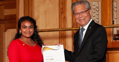 Tharane Thamodarar receives her Duke of Edinburgh’s International Award Gold Award certificate at Adelaide Town Hall from Governor of South Australia Hieu Van Le. Image courtesy of The Duke of Edinburgh’s International Award – South Australia.