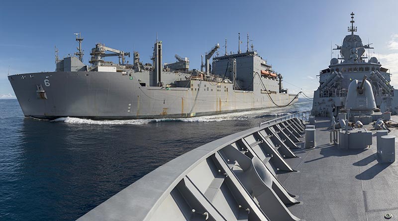 HMAS Arunta conducts a replenishment at sea with USNS Amelia Earhart. Photo by Leading Seaman Jarrod Mulvihill.