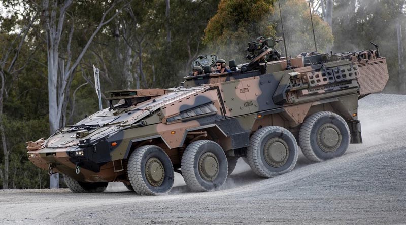 A student from The 2nd/14th Light Horse Regiment, (Queensland Mounted Infantry) negotiates the obstacle course at Green Bank Training Area during the first driver training conversion course for the Australian Army’s Boxer Combat Reconnaissance Vehicle. Photo by Corporal Nicole Dorrett.