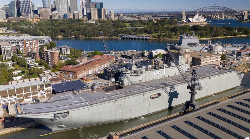 HMAS Canberra enters the Captain Cook Graving Dock at Garden Island, Sydney. Photo by Chief Petty Officer Kelvin Hockey.