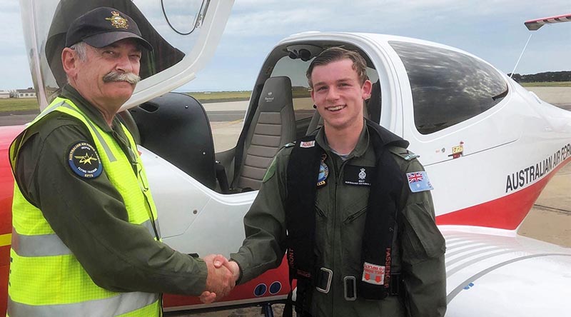 LCDT Aaron May, No 408 Squadron, is congratulated by EFTS Head of Operations SQNLDR Gary Presneill following his first solo flight in the Diamond DA40 NG at Point Cook, 5 October 2019. Photo by SQNLDR (AAFC) Scott Wiggins.