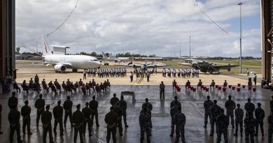 Defence members and guests at a 50th anniversary memorial service for Magpie 91 at RAAF Base Williamtown. Photo by Brett Sherriff.