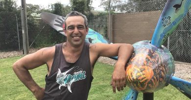 Gunaikurnai artist Alfie Hudson with the PC-9/A propeller he painted, which has been installed at the front gate of RAAF Base East Sale.