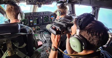 Crew on a RAAF C-27J Spartan scan south-west Pacific seascape for illegal fishing. Photographer unknown.