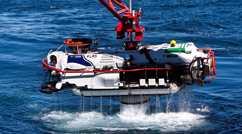 The LR5 submersible clears the water as it begins its recovery after a successful personnel transfer with HMAS Farncomb in the East Australian Exercise Area during Exercise Black Carillon 2013. Photo by Leading Seaman Brenton Freind.