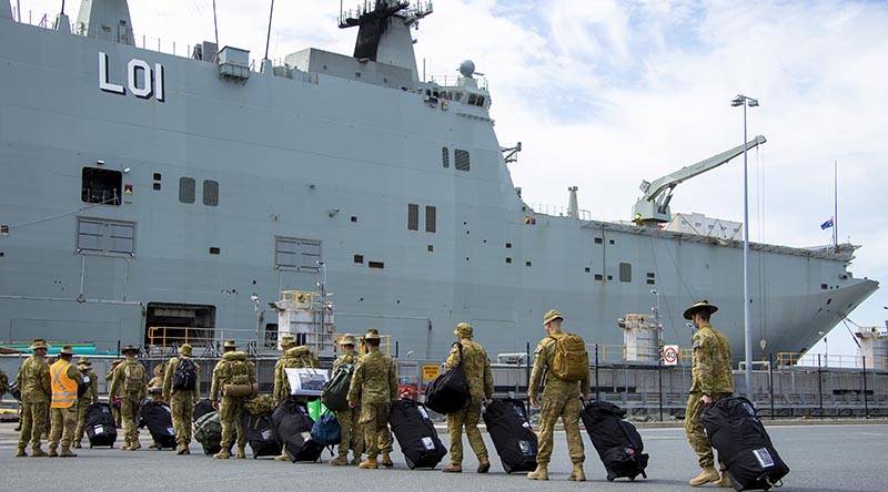 Australian Army soldiers from 6th, 7th, 16th and 17th Brigades board HMAS Adelaide at Port of Brisbane, before they deploy to Fiji tp provide humanitarian assistance and disaster relief. Photo by Corporal Dustin Anderson.