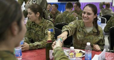 Australian Army Lance Corporal Ella Jones enjoying Christmas festivities at Taji Military Complex, Iraq. Photo by Corporal Steve Duncan.