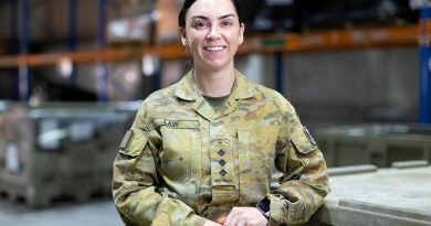 Captain Jess Law in the warehouse of the ADF’s main operating base in the Middle East region. Photo by Corporal Tristan Kennedy.