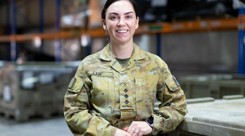 Captain Jess Law in the warehouse of the ADF’s main operating base in the Middle East region. Photo by Corporal Tristan Kennedy.
