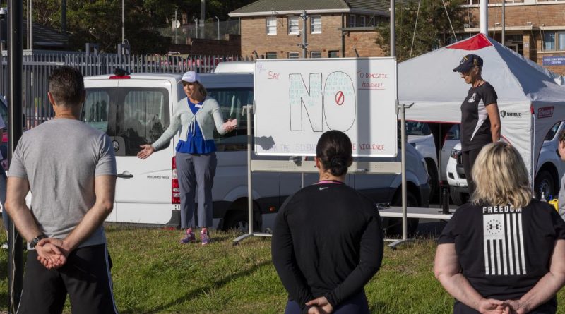 Northern Beach Women’s Shelter Manager Narelle Hand addresses participants of the 'Say No to Domestic Violence' walk at HMAS Penguin in Sydney. Photo by Leading Seaman Christopher Szumlanski.