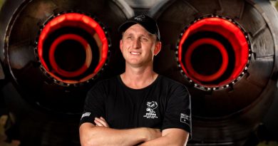 Corporal Brody Peate, a No. 75 Squadron aircraft technician, with an F/A-18A Hornet on RAAF Base Tindal. Photo by Corporal David Said.