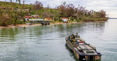 Soldiers from the 10th Force Support Battalion drive a light amphibious resupply cargo 5 onto the island of Galoa, in Fiji to drop off supplies required to repair buildings affected by Cyclone Yasa. Photo by Corporal Dustin Anderson.