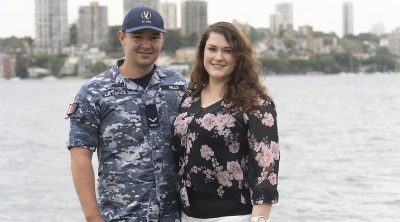 Leading Aircraftman Ryan Mills with his wife Ellen at Fleet Base East, Sydney.