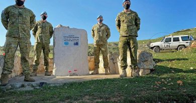 ADF personnel of the Observer Group Lebanon at the memorial for Royal Australian Corps of Transport officer Captain Peter McCarthy.