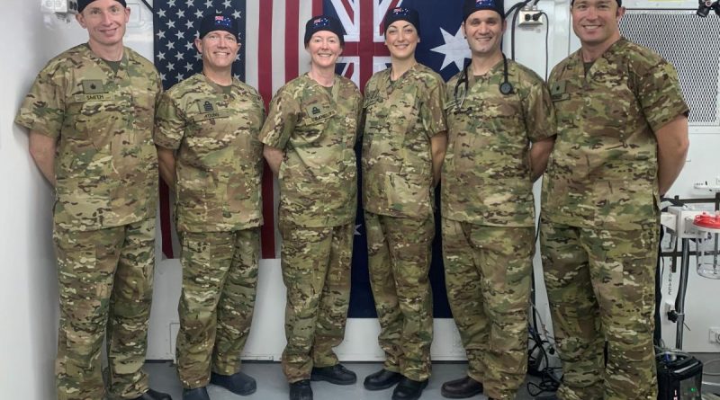 The ADF medical team embedded in Iraq’s Baghdad Diplomatic Support Centre, Afghanistan, Major Paul Smith, left, Captain Ian Young Lieutenant Commander Anna Kane, Captain Rachel Gillies, Major Adam Mahoney and Major Kyle Bender.