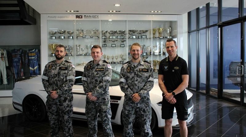 Leading Seaman Damien Smith, left, Able Seaman Nathan Steynberg, Leading Seaman Phillip Cowan and Matthew Roberts at Tickford Racing’s headquarters in Melbourne.