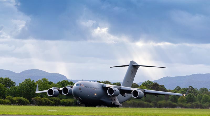 A No. 36 Squadron C-17A Globemaster lifts off from RAAF Base Richmond, New South Wales, taking aerial fire retardant to Western Australia. Photo by Corporal David Said.