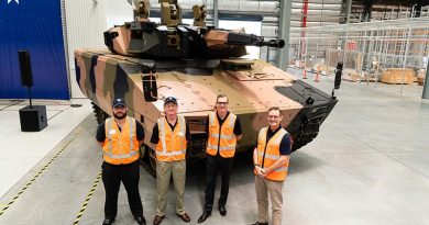 Craig Ramsay and Nick Stokesfrom Defcon Technologies, with Lee Davis, Land 400 Phase 3 and Gary Stewart from Rheinmetall at a Team Lynx event. Photo supplied.