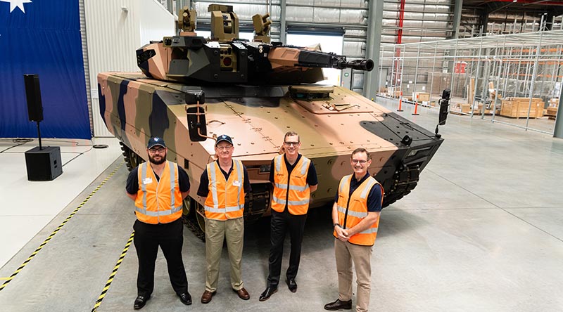 Craig Ramsay and Nick Stokesfrom Defcon Technologies, with Lee Davis, Land 400 Phase 3 and Gary Stewart from Rheinmetall at a Team Lynx event. Photo supplied.