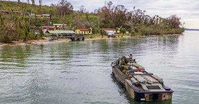 Australian soldiers from the 10th Force Support Battalion drive a LARC5 (light amphibious resupply cargo) onto Galoa, Fiji with humanitarian-assistance supplies. Photo by Corporal Dustin Anderson.