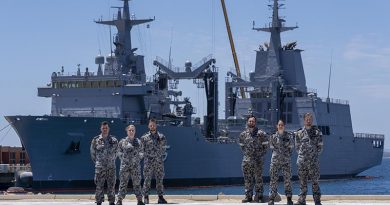 Marine Technicians Able Seamen Greg Hallet, Cassandra Bullock, Mason Turner, Cody Martin, Yassi Coban and Leading Seaman Morse Stanton in front of NUSHIP Supply at Fleet Base West, Western Australia. Photo by Leading Seaman Ronnie Baltoft.