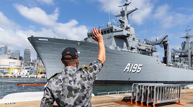 Commanding Officer of NUSHIP Supply, Captain Ben Hissink welcomes his ship to her home port, at Fleet Base East, Sydney. Photo by Leading Seaman Nadav Harel.