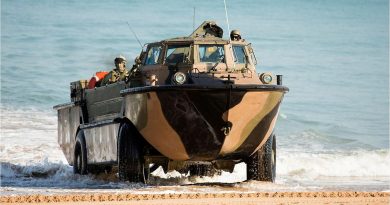 A LARC-V lands with soldiers of 2nd Battalion, Royal Australian Regiment during the amphibious assault at Fog Bay in the Northern Territory for Exercise Talisman Sabre 2015. Photo by Sergeant Mark Doran.