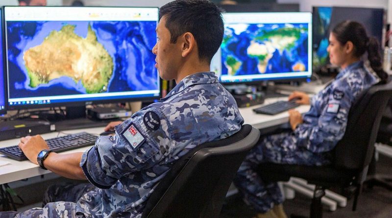 Corporal Yasunari Fujimura and Aircraftwoman Amandeep Kaur, from Distributed Ground Station – Australia, prepare for last year’s Exercise Coalition Virtual Flag. DGS-AUS is now No. 83 Squadron. Photo by Leading Aircraftwoman Jacqueline Forrester.