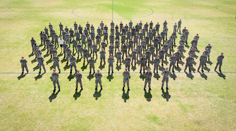 NUSHIP Stalwart's crew form for the first time on the sports field of HMAS Stirling, Western Australia. Photo by Leading Seaman Richard Cordell.