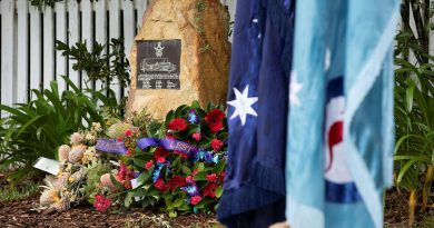 Wreaths surround the memorial plaque at the rededication service commemorating the 80th anniversary of the RAAF Anson A4-5 crash at Glenbrook, NSW. Photo by Corporal Kylie Gibson.