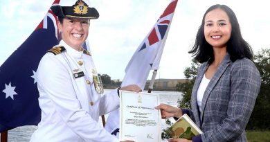 Commanding Officer HMAS Moreton Commander Phillipa Hay appoints Roslyn Gibson to the Royal Australian Navy during a ceremony in Brisbane.