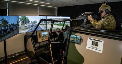 Forces Command Major Andrew Bone and Signaller Jon Taylor, rear, test the new Protected Mobility Tactical Training System at the Battle Simulation Centre, Gallipoli Barracks, Enoggera. Photo by Private Jacob Hilton.