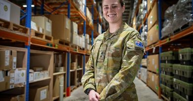 Lieutenant Madeline Meagher at the warehouse facility in the Middle East region. Photo by Sergeant Ben Dempster.