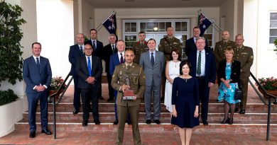 Corporal Gealan Toullea, front left, with Her Excellency Linda Hurley, front right, and guests at Government House in Canberra. Photo by Corporal Julia Whitwel.