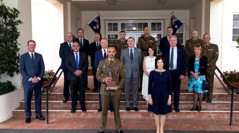 Corporal Gealan Toullea, front left, with Her Excellency Linda Hurley, front right, and guests at Government House in Canberra. Photo by Corporal Julia Whitwel.