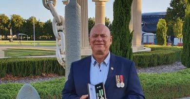 Former Chief Petty Officer Danny Joyce is awarded the Australian Service Medal at Anzac Park in Rockingham, Western Australia.