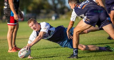 Petty Officer Stephen Swanson participates in a training session with the Navy Tridents rugby league team at the Lark Hill Sporting Complex in Port Kennedy, WA. Photo by Leading Seaman Ernesto Sanchez.