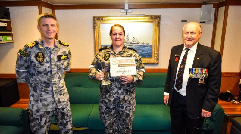 Commander Andrew Pepper with Able Seaman Melissa-Jane Bult and John Withers on board HMAS Hobart. Photo by Petty Officer Brendan Matchett.