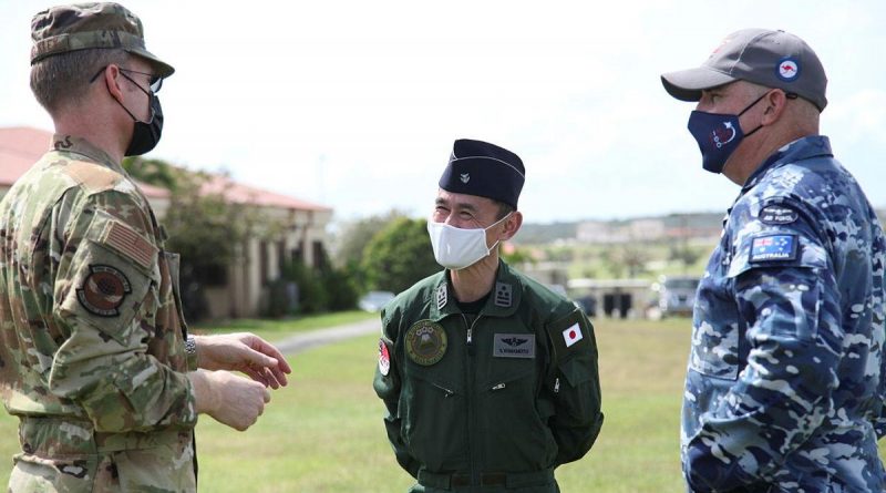 Lieutenant Colonel Adam Shockley from the US Air Force, Colonel Shinobu Yamamoto from the Japanese Air Self-Defense Force and Wing Commander Alan Brown from RAAF discuss operational matters during Exercise Cope North. Photo by Master Sergeant Masumi Suehara.