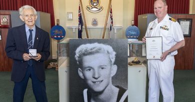 Former Able Seaman Ronald Bergman, 94, (and inset) is presented a World War II 75th anniversary commemorative medallion by the Executive Officer HMAS Cerberus Commander Martin Holzberger during Mr Bergman’s visit to the base. Photo by Leading Seaman James McDougall.