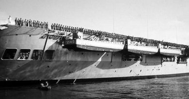 Australian troops bound for Vietnam line the flight deck of HMAS Sydney – the Vung Tau Ferry – on departure from Garden Island, Sydney.