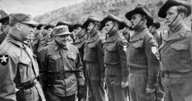 General J. van Fleet, General Officer, 8th US Army inspects members of the 3rd Battalion, Royal Australian Regiment (3RAR), while bestowing the presidential citation in recognition of the unit's action at Kapyong, Korea. AWM 083857