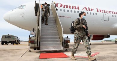 The first 2021 Marine Rotational Force - Darwin Marines, disembark their charter aircraft at RAAF Base Darwin, Northern Territory. Photo by Petty Officer Peter Thompson.