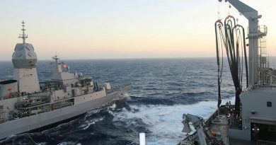 Navy frigate HMAS Anzac in company with HMAS Sirius during a replenishment at sea exercise off the coast of Western Australia.