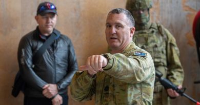 Regimental Sergeant Major Warrant Officer Class One Michael Carroll demonstrates urban clearing techniques to medical personnel during a visit to Gallipoli Barracks, Brisbane in 2020. Photo by Trooper Jonathan Goedhart.